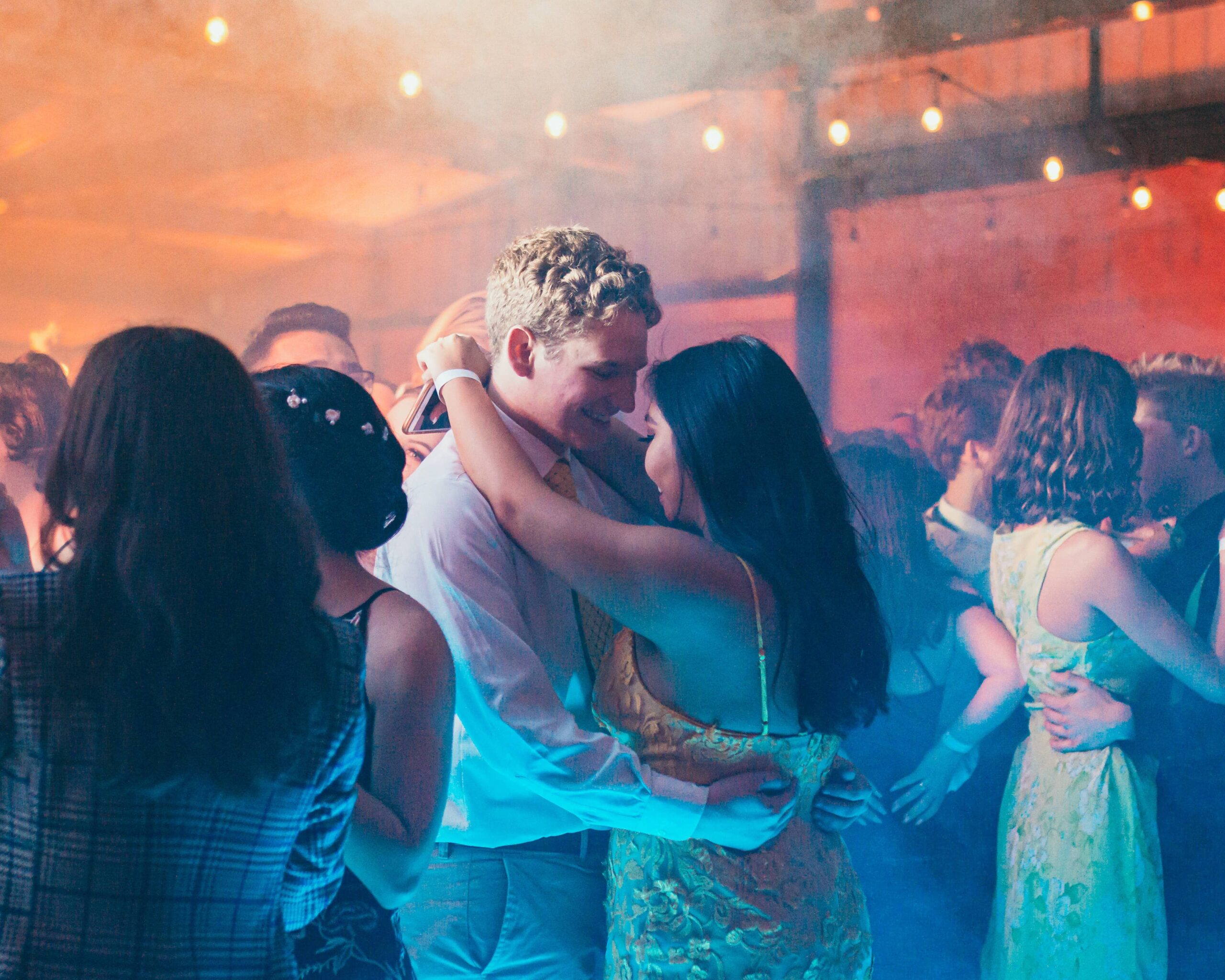 a couple slow-dancing at a wedding